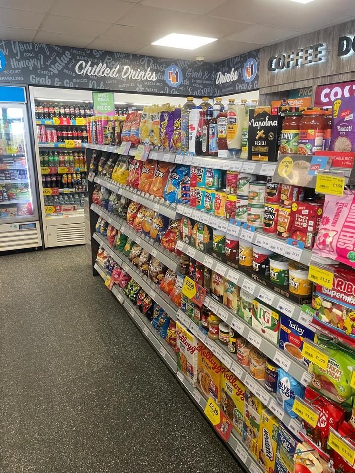 Clean, well-stocked aisle inside our Londis store